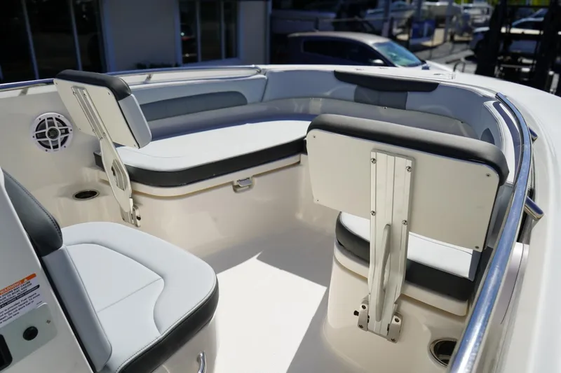 Slide: The Image of Interior seating of 2026 Robalo R202 Explorer boat, featuring cushioned seats and sleek design. - 16