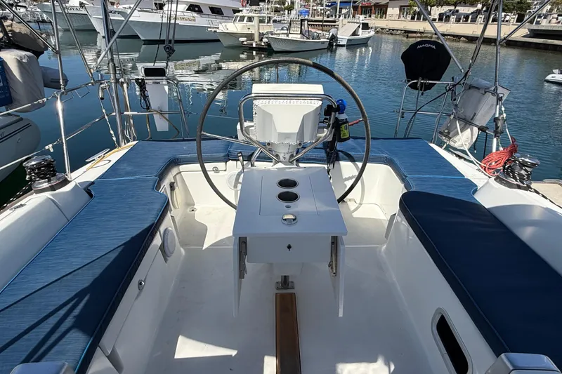 Slide: The Image of Cockpit of 2012 Beneteau Oceanis 37 sailboat docked in marina. - 35