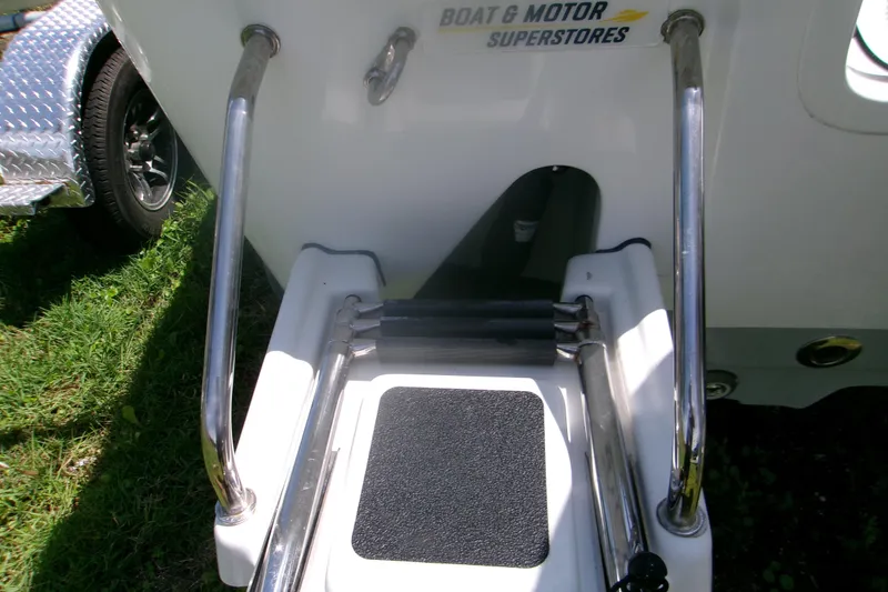 Slide: The Image of 2023 Sportsman Masters 247 Bay Boat ladder and trailer detail. - 5