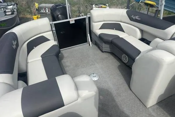 The Image of 2022 SunChaser Geneva 22' RL DH pontoon boat interior with spacious seating and modern design. - 1