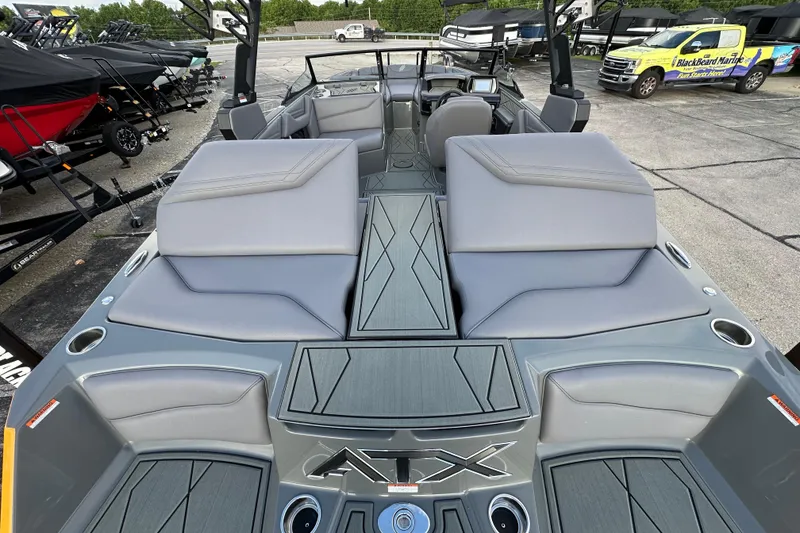 Slide: The Image of 2026 ATX Surf Boats 22 Type-S interior with gray seating and sleek design. - 10