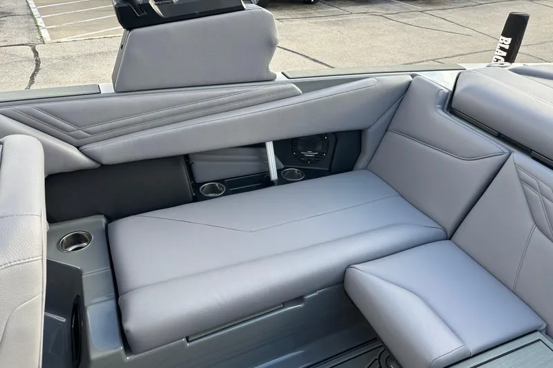Slide: The Image of 2026 ATX Surf Boats 22 Type-S interior with sleek gray seating and cup holders. - 11