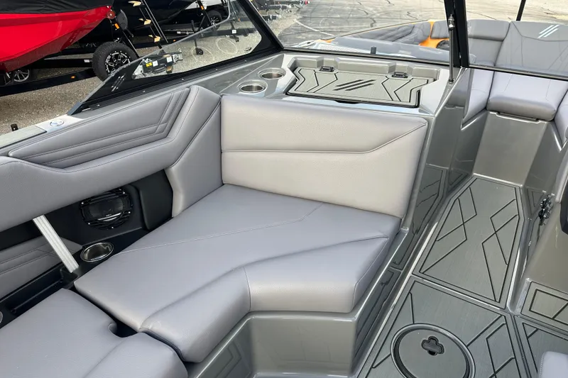 Slide: The Image of 2026 ATX Surf Boats 22 Type-S interior with sleek gray seating and modern design. - 14
