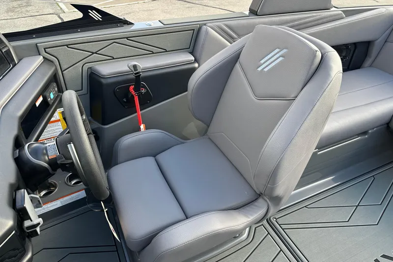 Slide: The Image of 2026 ATX Surf Boats 22 Type-S interior with sleek gray seating and modern dashboard. - 15