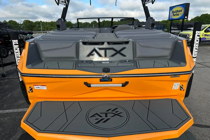 Slide: The Image of 2026 ATX Surf Boats 22 Type-S, vibrant orange exterior, showcased at Blackbeard Marine. - 8