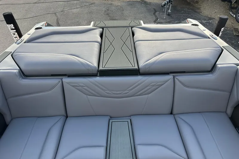 Slide: The Image of 2026 ATX Surf Boats 22 Type-S interior with sleek gray upholstery and modern design. - 9
