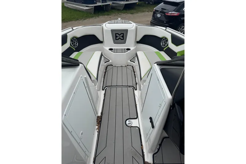 Slide: The Image of 2021 Yamaha Boats 212XD interior with sleek seating and modern design. - 6