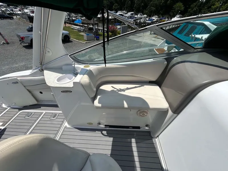 Slide: The Image of 2001 Four Winns 328 Vista boat interior with seating and cup holder. - 20