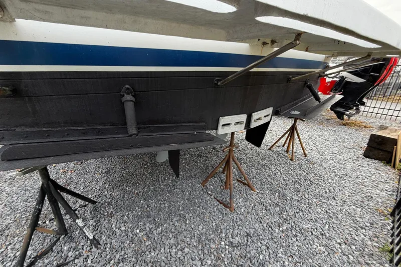 Slide: The Image of 1984 Golden Star 38 Trawler on stands, showing hull and propeller area. - 11