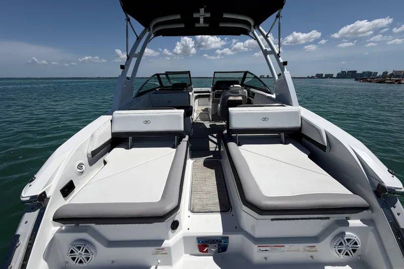 Slide: The Image of 2022 Cobalt R6 Outboard boat with spacious seating on open water. - 7
