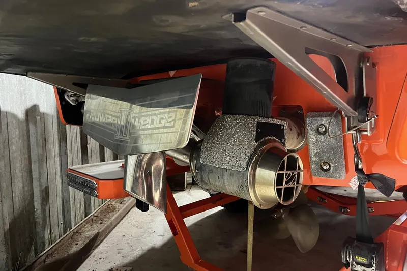 Slide: The Image of 2021 Malibu Wakesetter 25 LSV boat underside with propeller and Power Wedge III. - 5