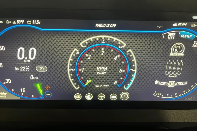 Slide: The Image of Dashboard of a 2021 Malibu Wakesetter 25 LSV showing RPM and speed indicators. - 6