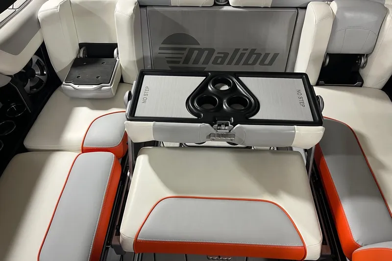 Slide: The Image of Interior of 2021 Malibu Wakesetter 25 LSV boat with seating and cup holders. - 8