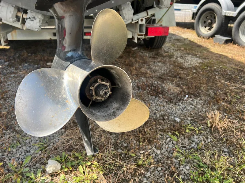 Slide: The Image of Propeller of 1987 Grady-White Seafarer 226 boat on trailer, close-up view. - 18