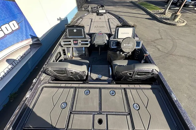 Slide: The Image of 2026 Ranger Z521R Garmin Cup-Equipped boat interior with advanced navigation systems. - 10