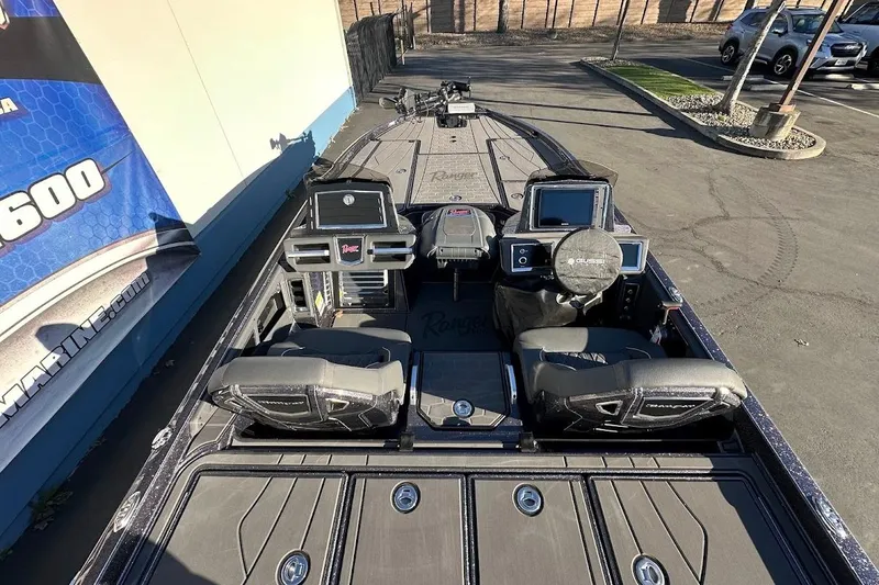 Slide: The Image of 2026 Ranger Z521R Garmin Cup-Equipped boat interior with advanced navigation systems. - 11