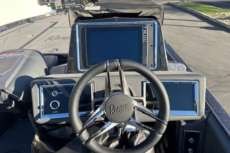 Slide: The Image of 2026 Ranger Z521R Garmin Cup-Equipped boat dashboard with advanced navigation displays. - 14