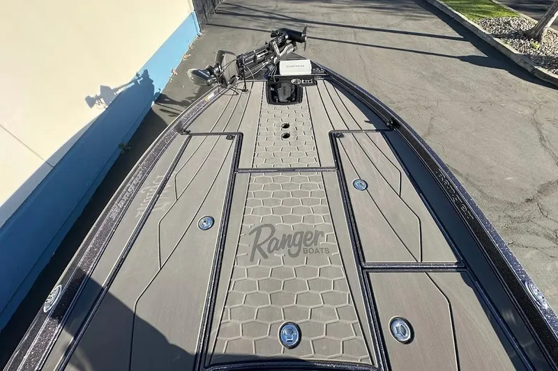 Slide: The Image of 2026 Ranger Z521R Garmin Cup-Equipped boat deck with advanced features. - 21