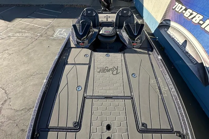 Slide: The Image of 2026 Ranger Z521R Garmin Cup-Equipped boat with sleek design and spacious deck. - 24