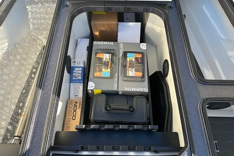 Slide: The Image of Storage compartment of 2026 Ranger Z521R with Garmin equipment and accessories. - 28