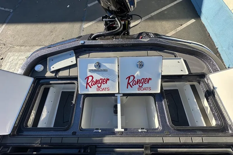 Slide: The Image of 2026 Ranger Z521R Garmin Cup-Equipped boat storage compartments, featuring Ranger Boats branding. - 31