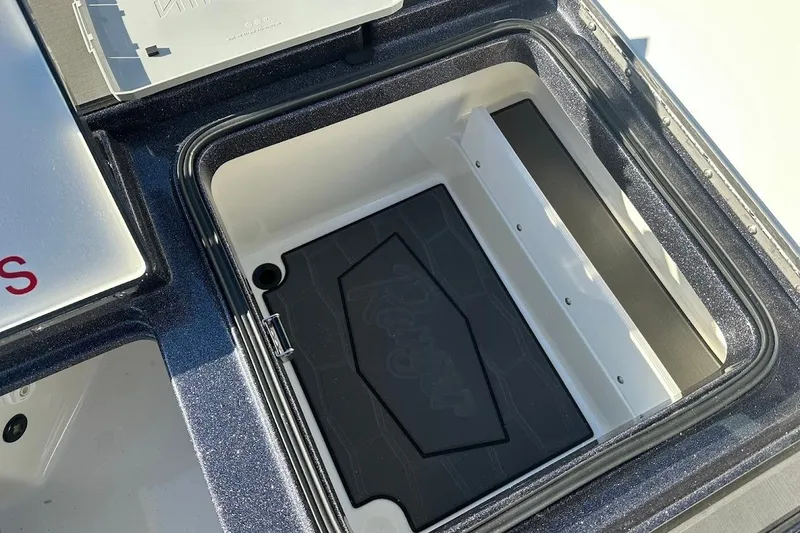 Slide: The Image of Open storage compartment of 2026 Ranger Z521R Garmin Cup-Equipped boat. - 33
