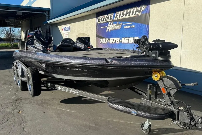 Slide: The Image of 2026 Ranger Z521R Garmin Cup-Equipped boat on trailer outside dealership. - 4