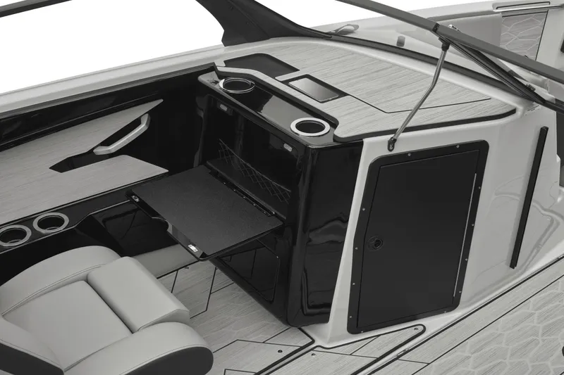 Slide: The Image of Interior of 2026 Yamaha Boats 222XD with modern seating and storage. - 12