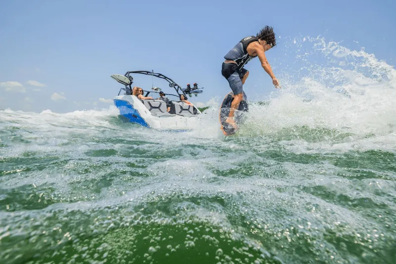Slide: The Image of Yamaha Boats 222XD 2026 in action during watersport adventure. - 26