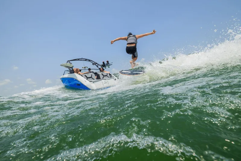 Slide: The Image of Yamaha Boats 222XD 2026 in action on the water. - 27