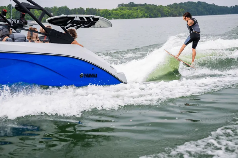 Slide: The Image of Yamaha 222XD 2026 boat towing surfer on lake. - 34