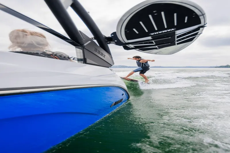 Slide: The Image of Yamaha 222XD 2026 boat with surfer riding a wave. - 35