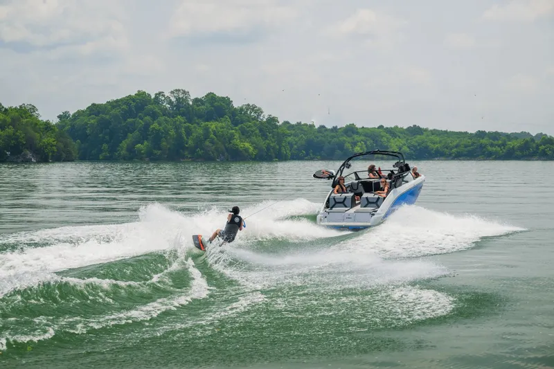 Slide: The Image of Yamaha 222XD 2026 towing wakeboarder on a lake. - 43