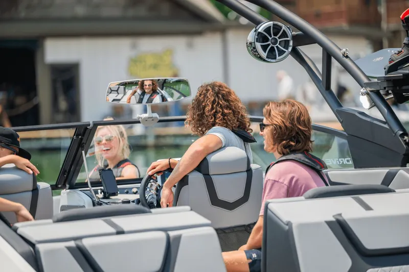 Slide: The Image of People enjoying a ride on a 2026 Yamaha 222XD boat. - 47