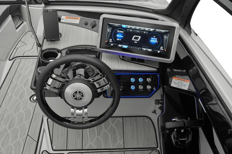Slide: The Image of Yamaha Boats 222XD 2026 cockpit featuring modern steering and display. - 8