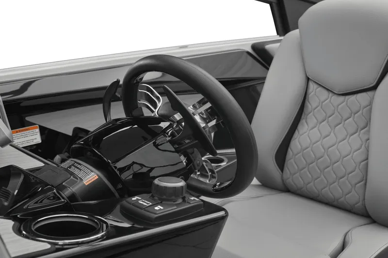 Slide: The Image of Interior of 2026 Yamaha Boats 222XD with steering wheel and seat. - 9