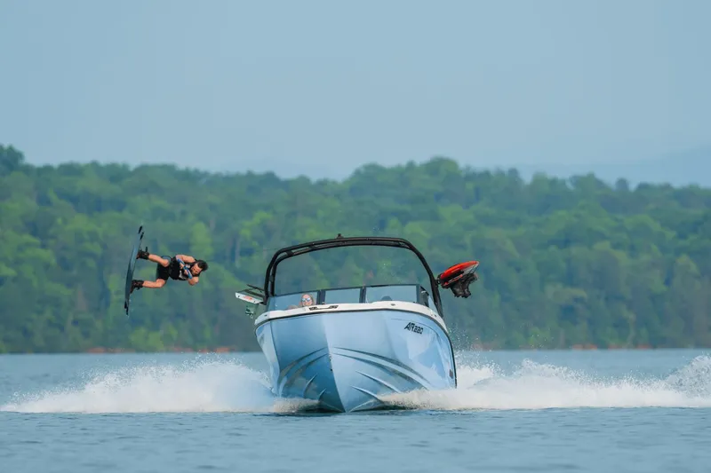Slide: The Image of Yamaha AR220 2026 towing wakeboarder on a lake. - 10
