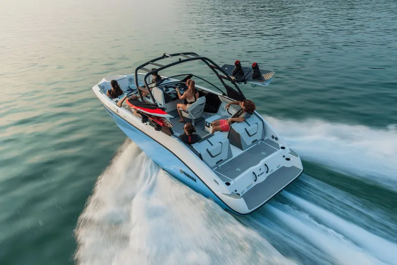 Slide: The Image of Yamaha AR220 2026 boat cruising on water with passengers. - 18