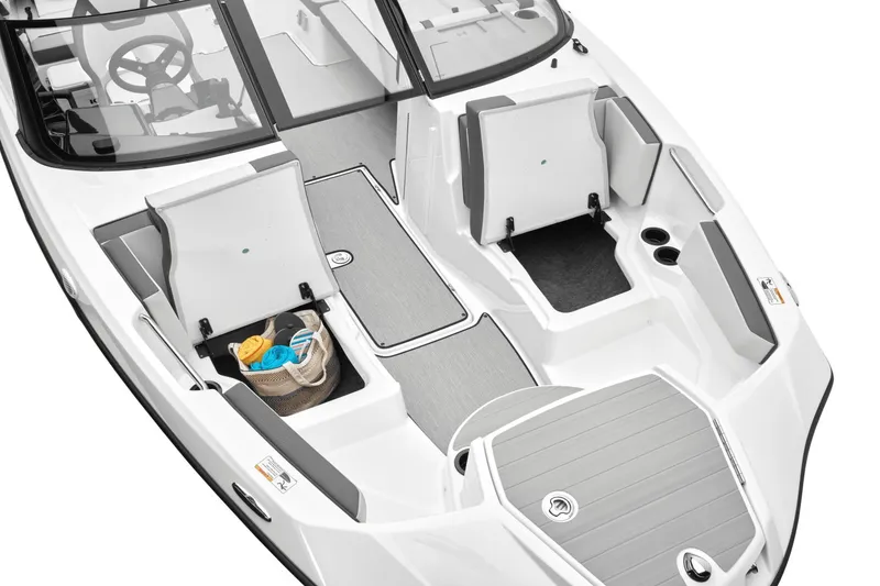 Slide: The Image of Interior of 2026 Yamaha Boats AR220 with storage and steering wheel. - 24