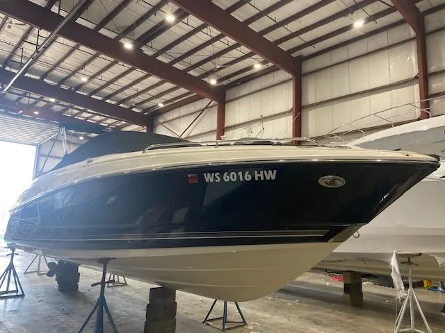 The Image of 2012 Monterey 264FS boat elevated in storage facility. - 0