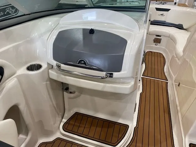 Slide: The Image of Interior of a 2012 Monterey 264FS boat with wood flooring. - 12