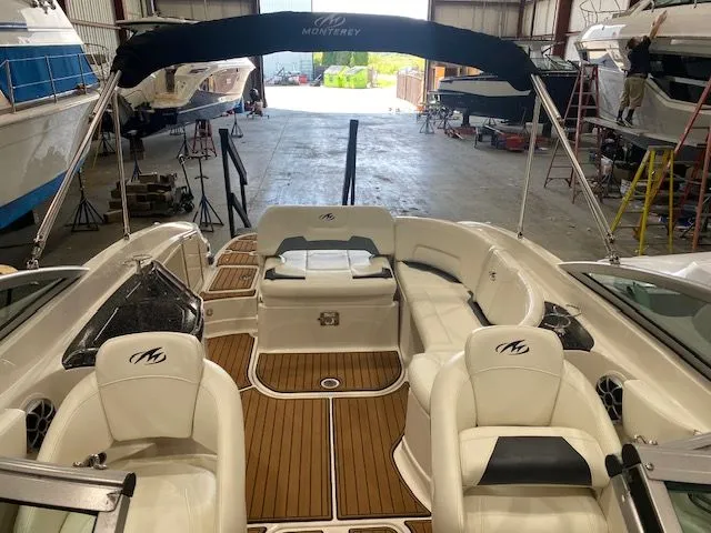 Slide: The Image of Interior view of a 2012 Monterey 264FS boat in a shipyard. - 19