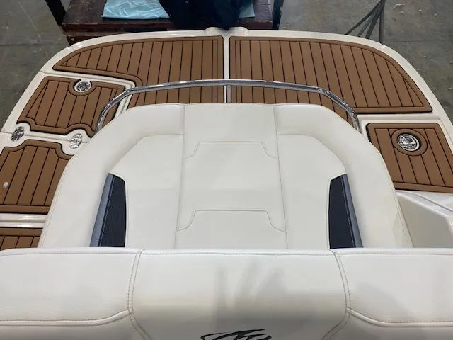 Slide: The Image of Rear view of a 2012 Monterey 264FS boat with teak deck. - 3