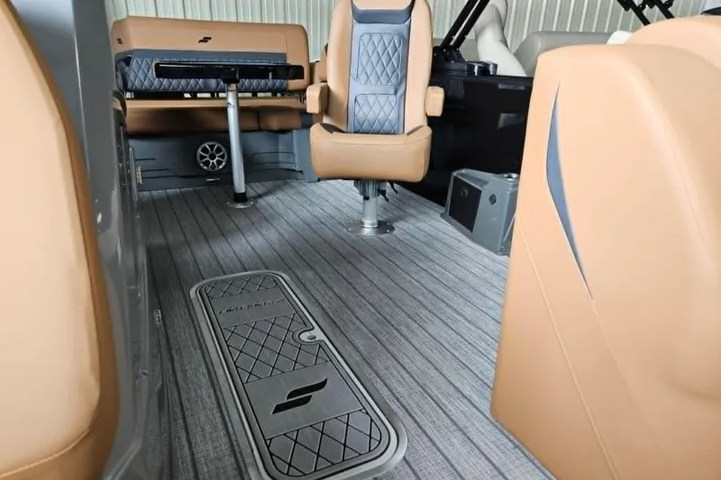 Slide: The Image of Interior of 2026 Starcraft SLS 3 DL DH BAR boat with luxurious seating and flooring. - 12
