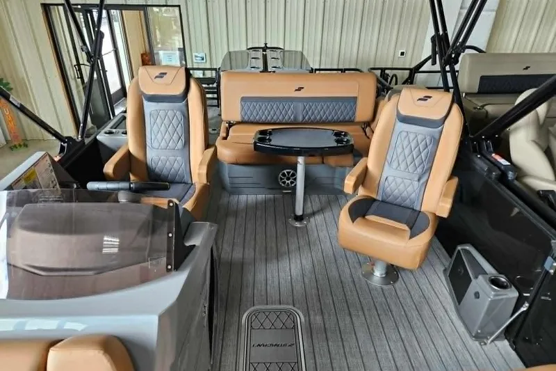 Slide: The Image of Luxurious interior of 2026 Starcraft SLS 3 DL DH BAR boat with plush seating and modern design. - 13