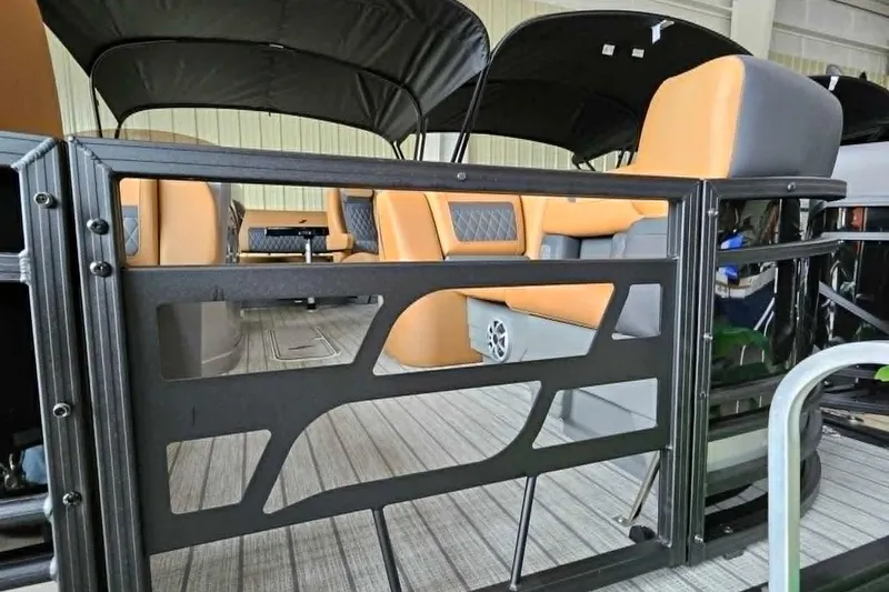 Slide: The Image of 2026 Starcraft SLS 3 DL DH BAR pontoon boat interior with modern seating and sleek design. - 2