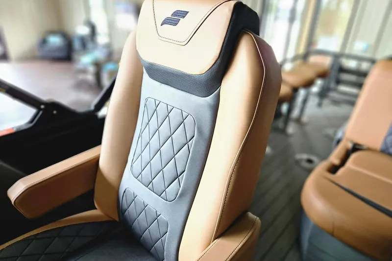 Slide: The Image of Luxurious seating in 2026 Starcraft SLS 3 DL DH BAR boat, featuring quilted design. - 5