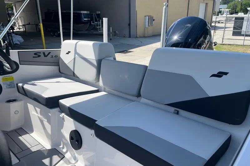 Slide: The Image of 2026 Starcraft SV 16 OB boat interior with cushioned seating and modern design. - 15