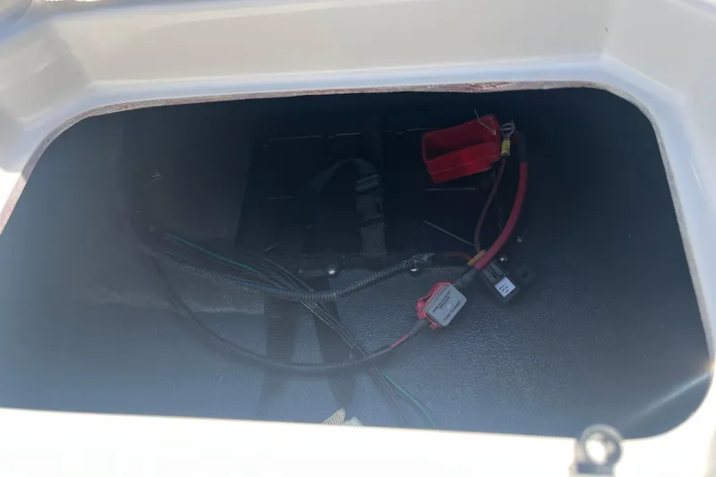 Slide: The Image of Storage compartment of 2026 Starcraft SV 16 OB boat with wiring and connectors. - 29
