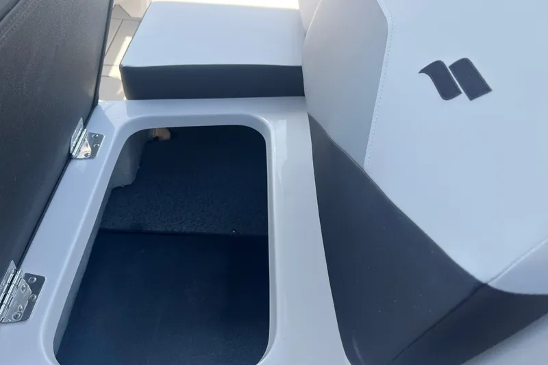 Slide: The Image of 2026 Starcraft SV 16 OB boat seat with open storage compartment. - 35